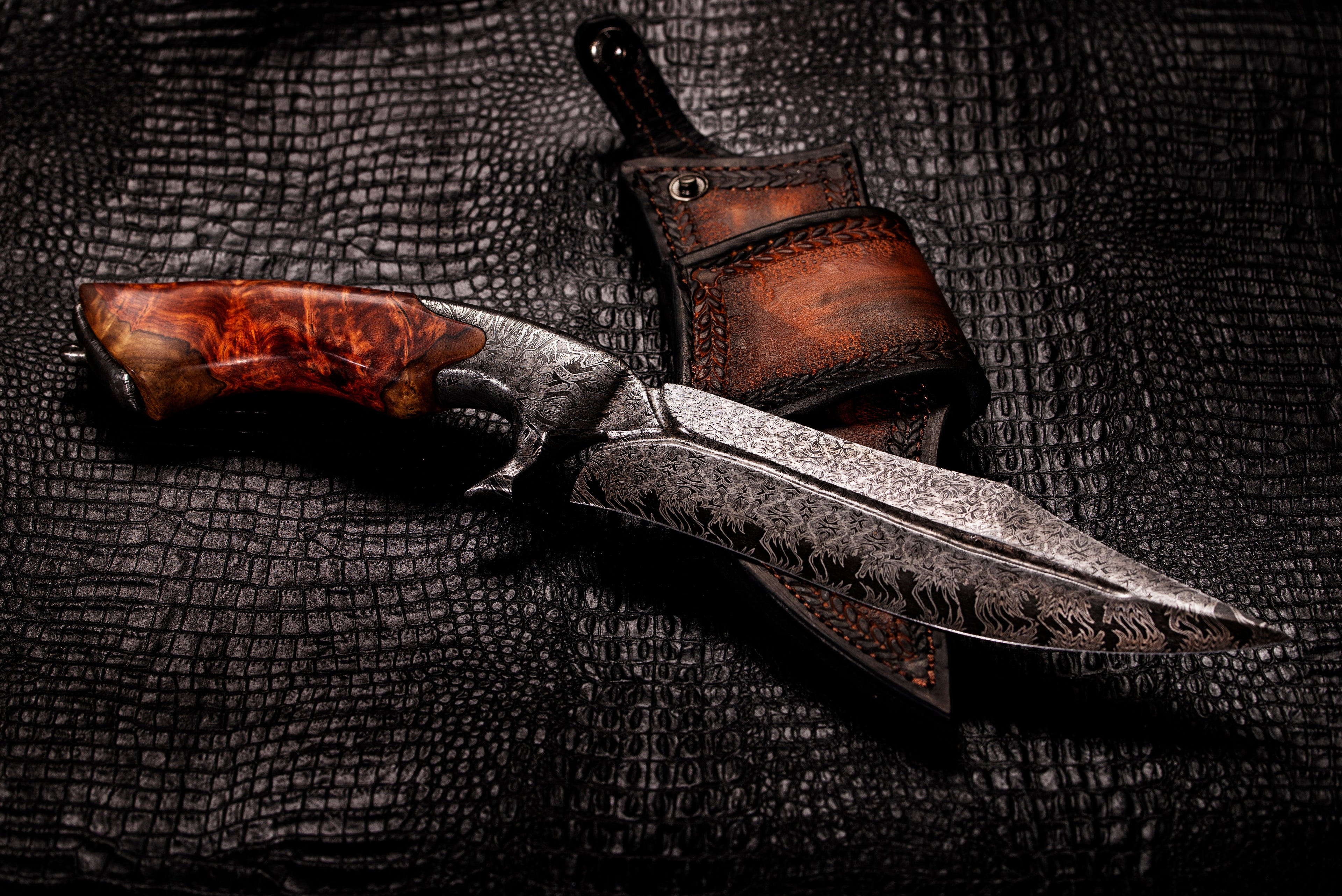 Decorative knife with wooden handle on a textured dark surface